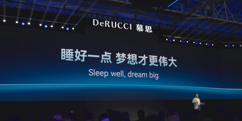 Promotional lifestyle shot with the slogan "Sleep Well, Dream Big."