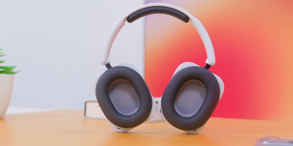 Close-up of the soft ear cushions, highlighting the material texture and ergonomic padding for long-wear comfort.