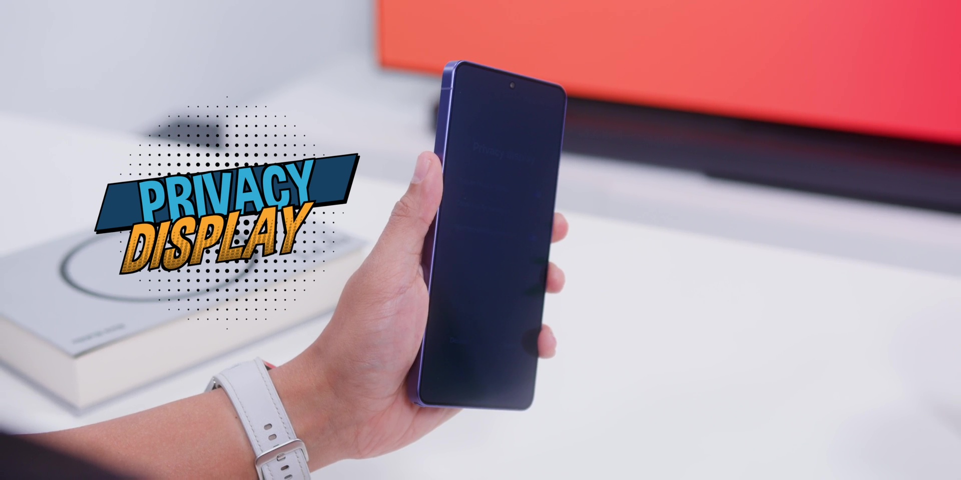 Demonstrating the Galaxy S26 Ultra privacy display feature at an angle.