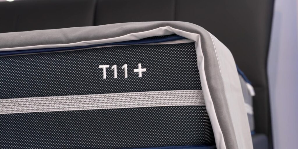 Product showcase of the T11+ AI Smart Mattress unit.