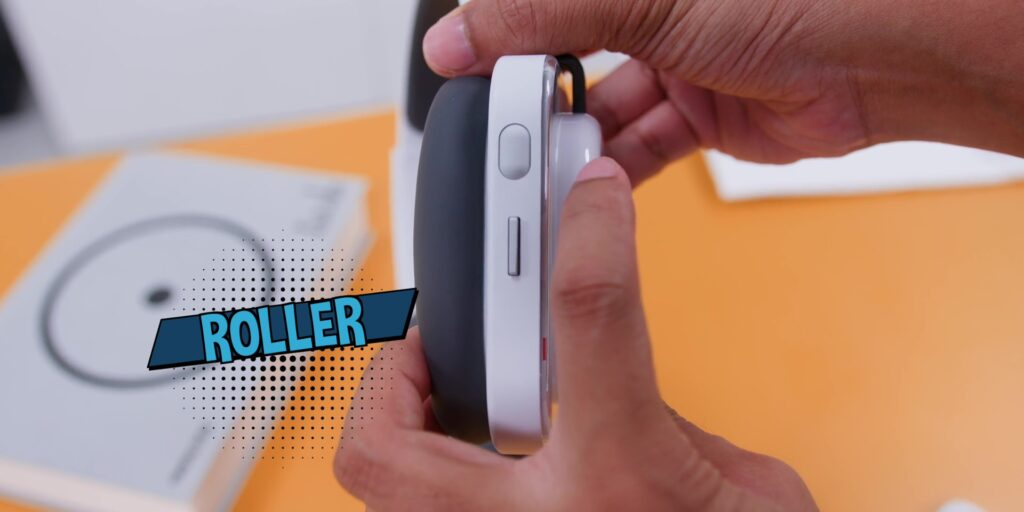 Focus on the tactile mechanical roller integrated into the earcup for volume or playback adjustment.