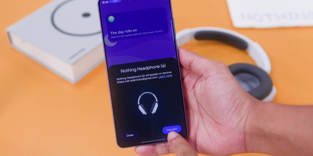 Visual representation of the Google Fast Pair notification appearing on an Android smartphone next to the headphones.