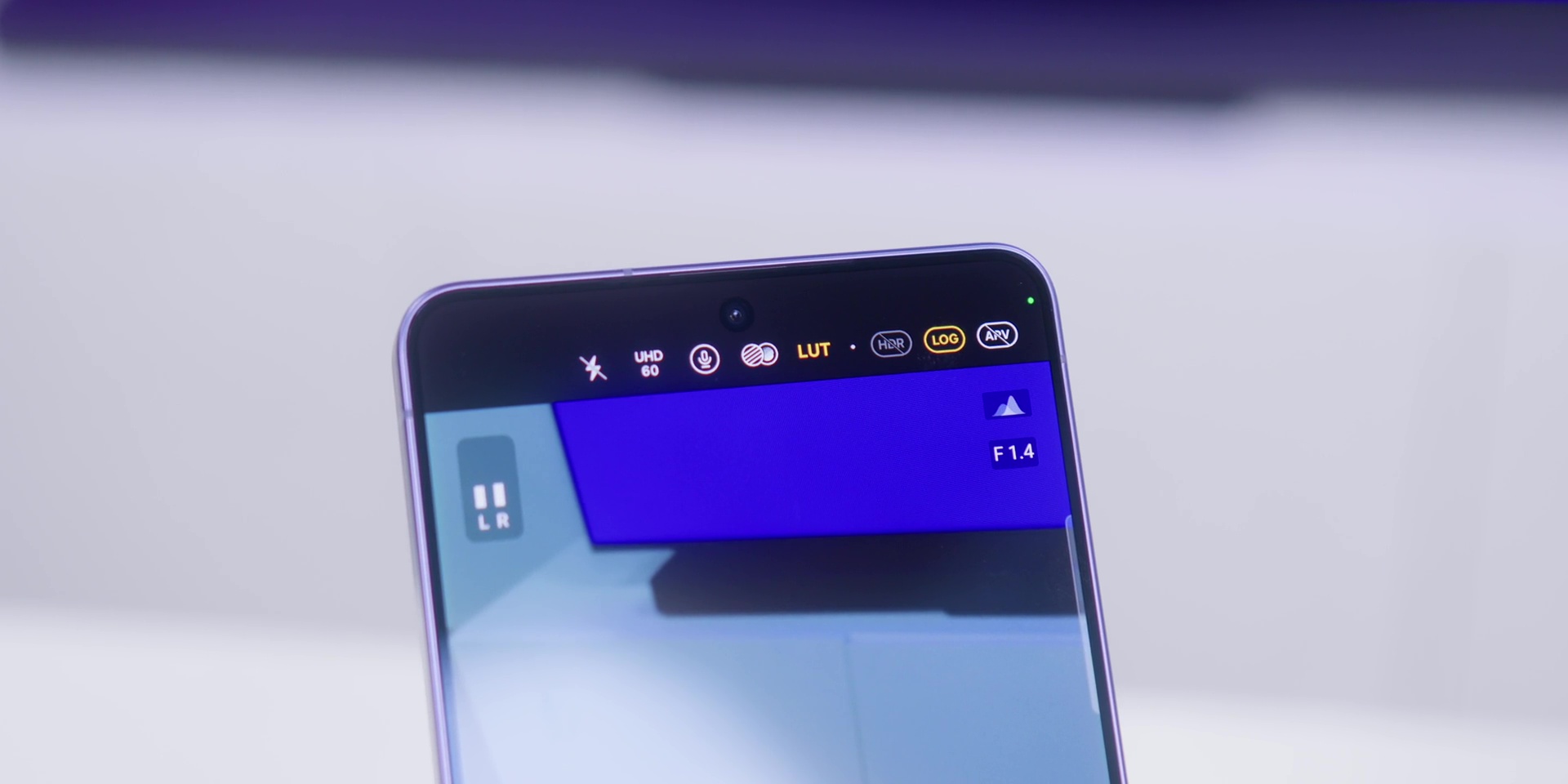 Toggling the LOG video recording setting in the camera app.
