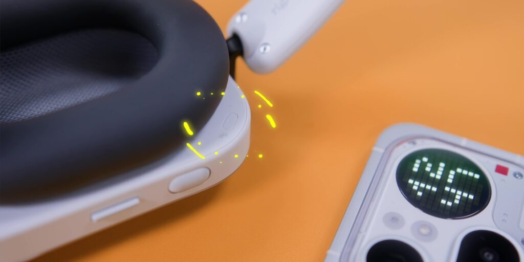Close-up view of the dedicated Bluetooth pairing button and its location on the chassis.