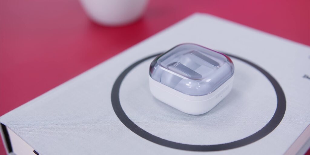Close up of the redesigned Samsung Galaxy Buds4 Pro charging case featuring a transparent lid.